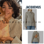 Aybüke Pusat’ın sırtı açık detaylı çizgili gömleğiyle verdiği poz